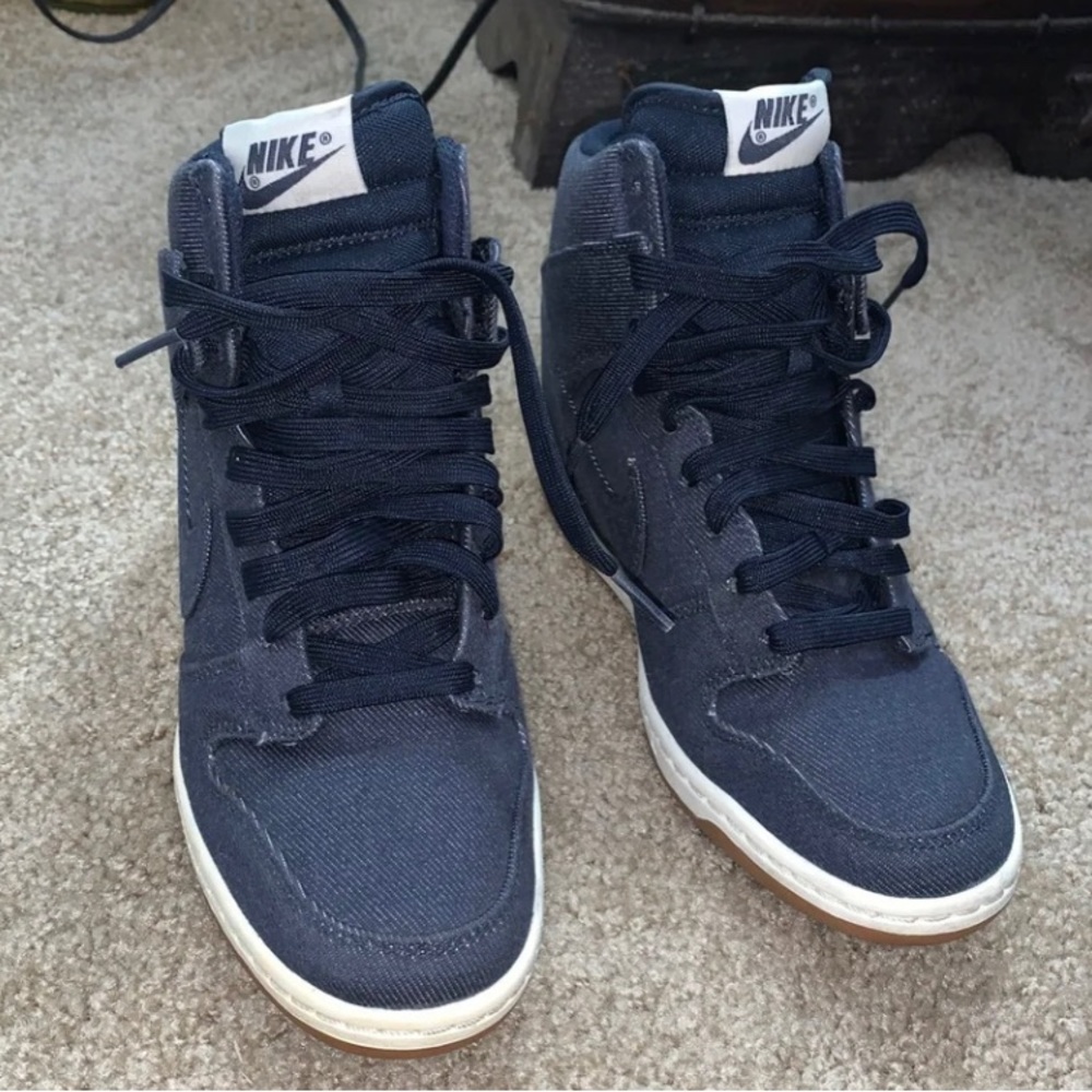 Blue heeled Nike shoes
